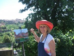 Joyce Frederick painting in Sienna, Italy
